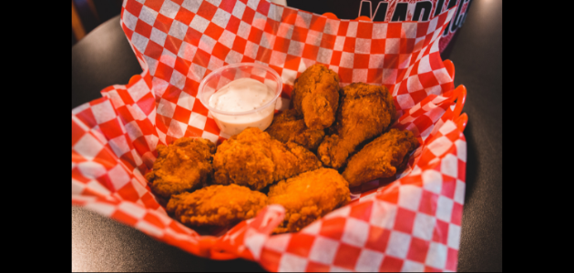 Alleged Impaired driver hits car, stops to eat wings